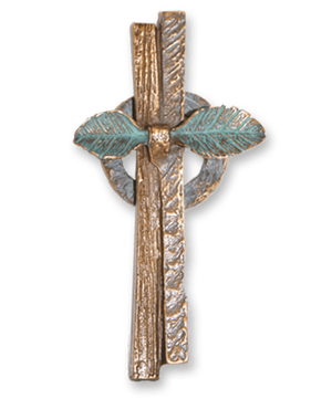 Ornament med kors i bronse fra Sigvartsen Steinindustri